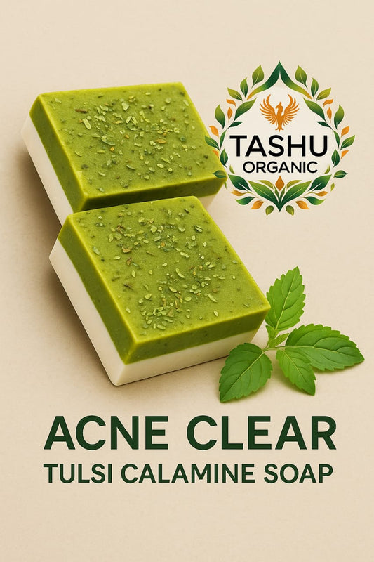 Two green soap bars with tulsi leaves on a beige background, featuring TASHU Organic logo.