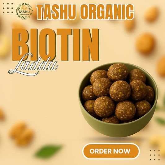 Bowl of TASHU Organic Biotin Laddu with promotional text on a beige background