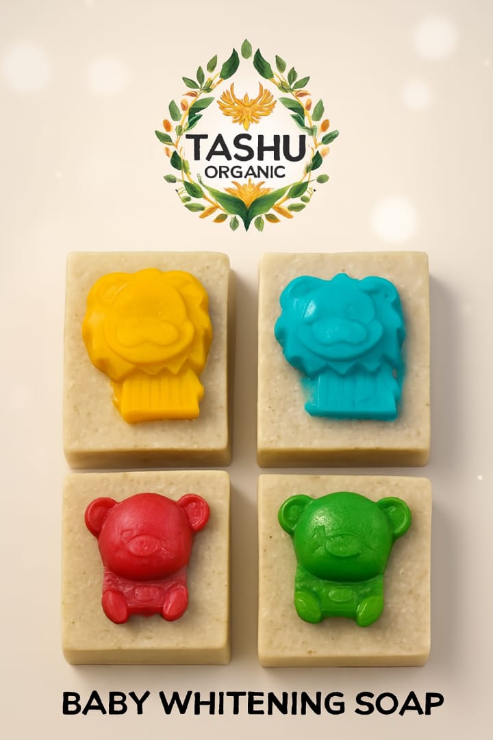 Four colorful baby-shaped soaps with TASHU Organic logo on a light background