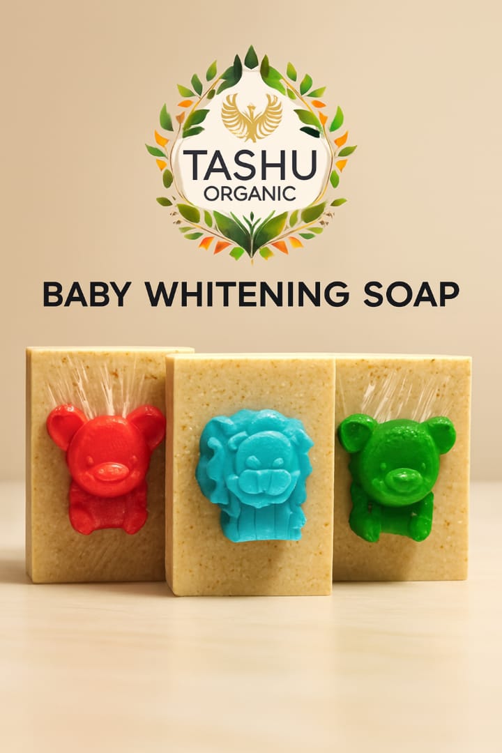 Three baby-shaped soaps with red, blue, and green designs on a beige background, featuring TASHU Organic branding.