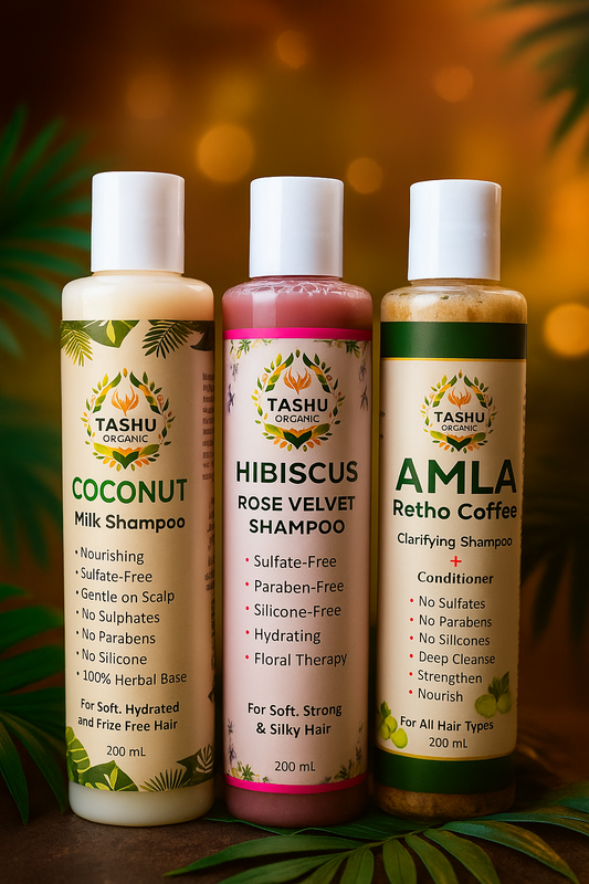 Three TASHU Naturals shampoo bottles with different scents on a leafy background